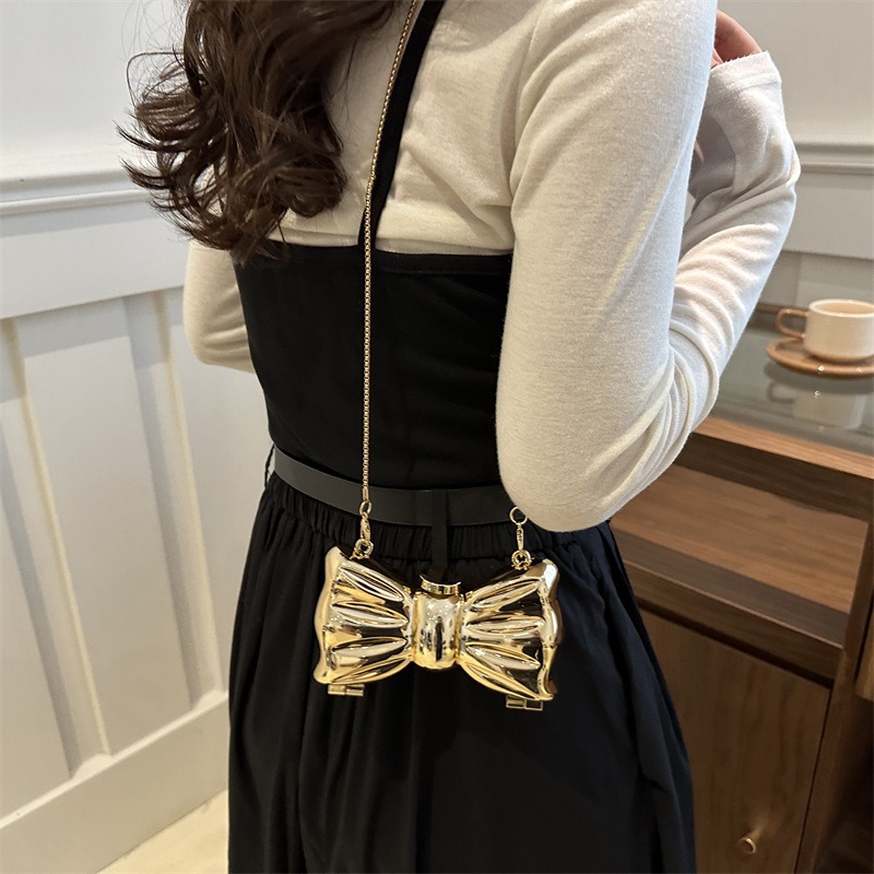 Glossy Gold Metal Bow Shaped M - Clutch Bag Evening ulasan dan harga